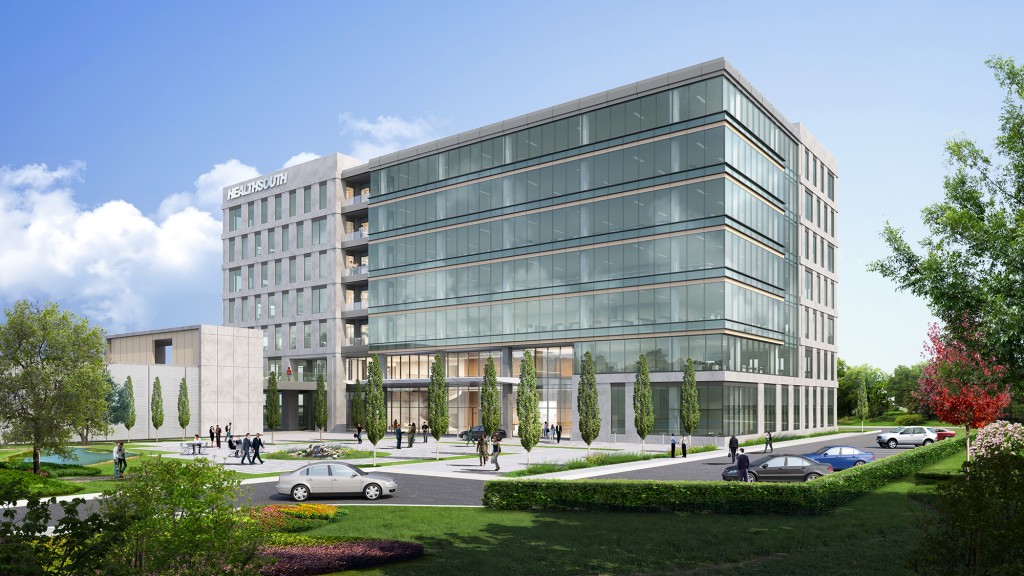 A large building with a parking lot.